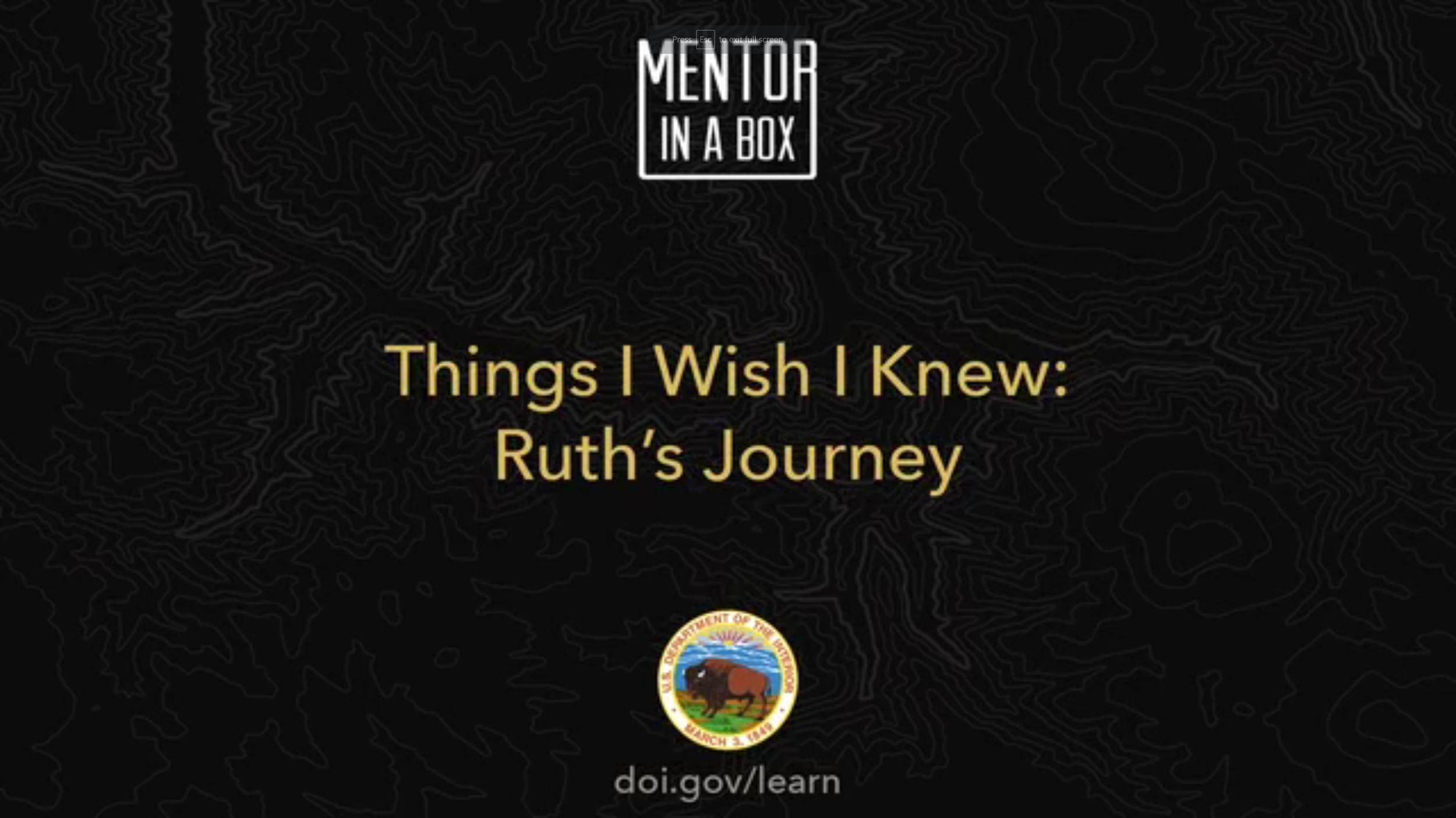 Title card from the Mentor in a Box video series — 'Things I Wish I Knew: Ruth's Journey' — over a dark topographic background with the Department of the Interior seal and doi.gov/learn.
